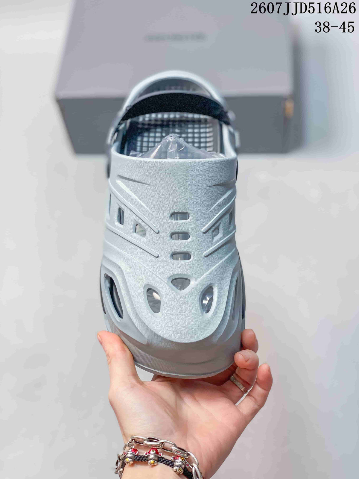 Top view of the clog sandal showing the ventilated upper, textured footbed, and open heel area.