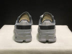 Rear view of the pair showing padded collars, dark heel bands, and structured white heel sections.