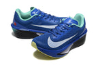 Pair of blue Nike Zoom Fly 6 shoes with white swooshes and mint details
