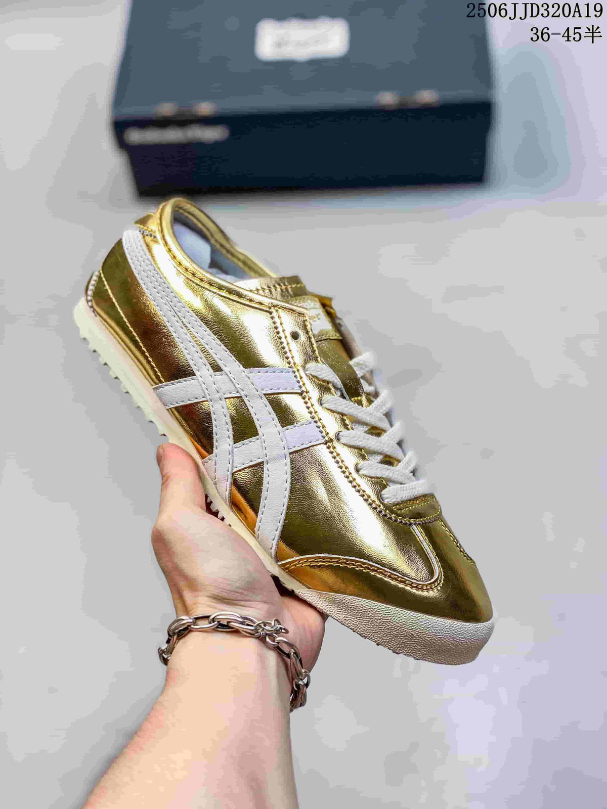 Metallic gold low-top sneaker with pale side stripes and white laces