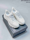 Pair of white ECCO lace-up sneakers displayed on an ECCO shoebox; style code 2607GDD846A16 and size range 38–44 are visible.