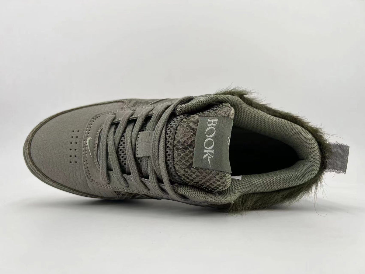 Top view showing the laces, patterned tongue, and fuzzy heel trim