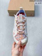 Front view of the shoe showing its lace-up closure and patterned upper