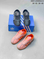 Pink and black adidas Originals Tokyo sneakers shown together with an adidas shoebox; the image text shows size ranges 36–45 and 36–40 and code 2607JJD265A15.