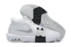 White low-top basketball shoes with black details, shown from the side and outsole.