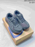 Pair of dark gray ASICS Magic Speed 4 running shoes displayed on an ASICS shoe box; overlay text shows product code 2607TGD675A15 and a 39–45 half-size range.