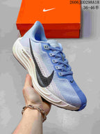 Side view of a light blue Nike Pegasus Plus Next Nature running shoe