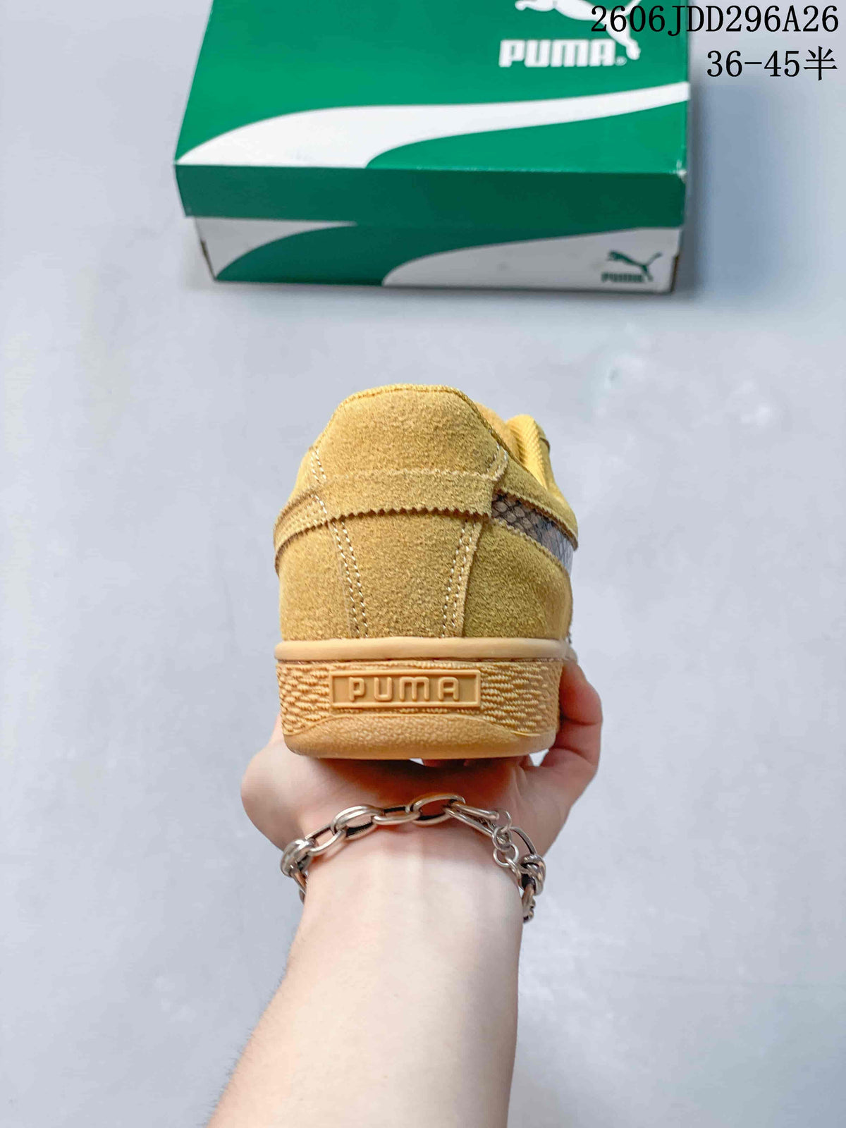 Rear view of the wheat sneaker showing the padded heel collar, stitched panels and PUMA heel branding.