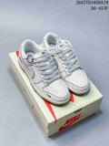 Pair of white Nike Dunk Low sneakers with light patterned laces displayed on a Nike shoebox; image text shows style code 2607VD1609A19 and EU size range 36–45.