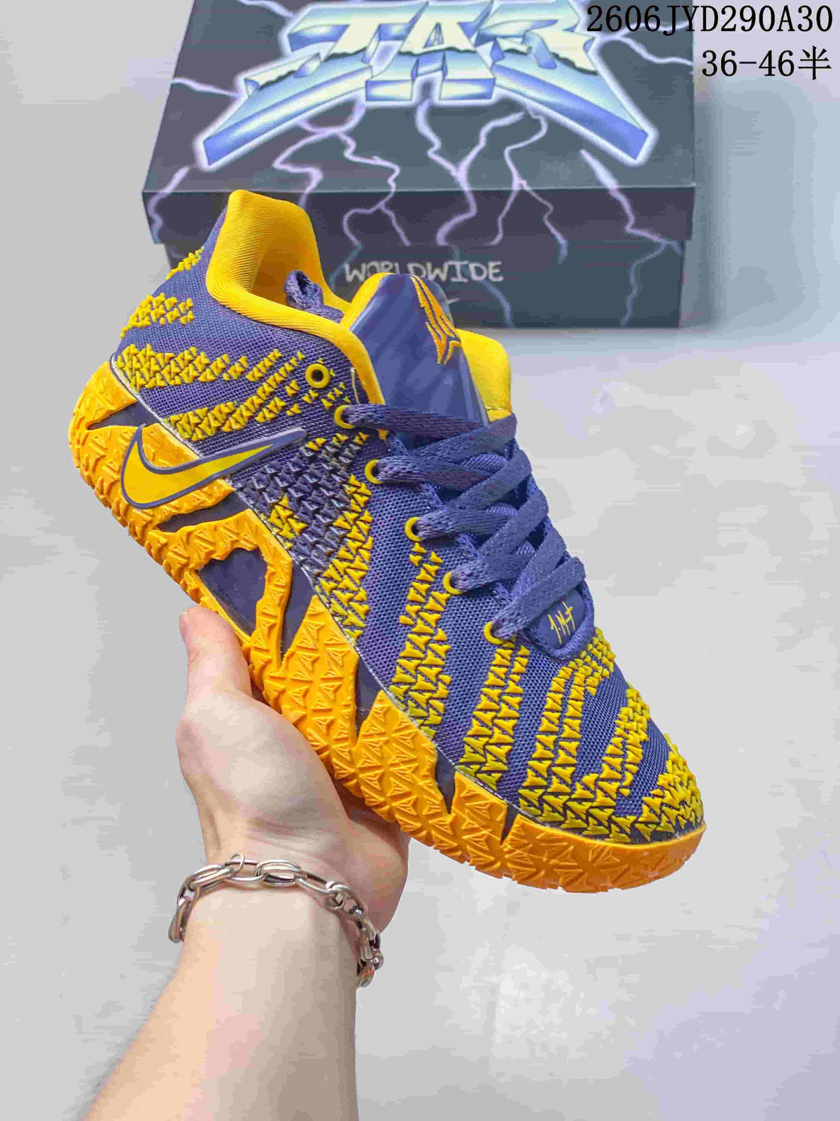 Purple and yellow Nike Ja 3 basketball shoe