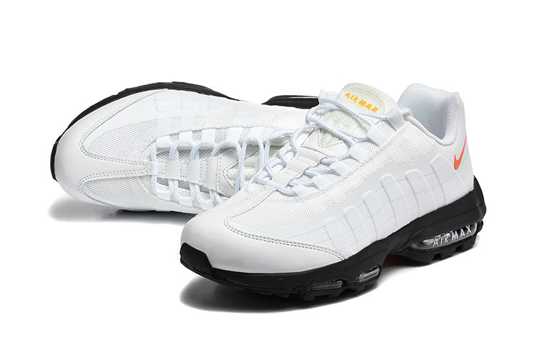 Nike Air Max White and Black Sneakers with Orange Swoosh