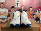 Front view of the white lace-up Mizuno Wave Momentum 3 shoes with dark blue outsoles.