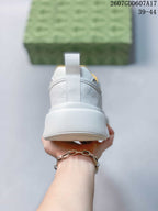 Rear view showing the white heel, pull tab and padded collar.