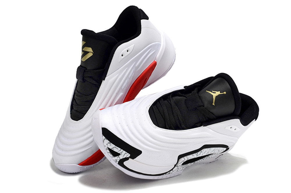 White and black Jordan Luka 3 basketball shoes with red accents and a patterned side panel