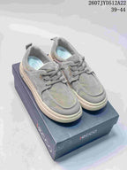 Gray ECCO lace-up sneakers displayed on an ECCO shoe box; style code 2607JYD512A22 and size range 39–44 are visible.