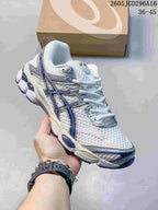 White and navy ASICS GEL-Cumulus 16 sneaker with a mesh-look upper