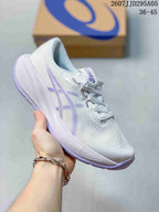 White ASICS running shoe with lavender accents, knit-style upper, and pale purple outsole.