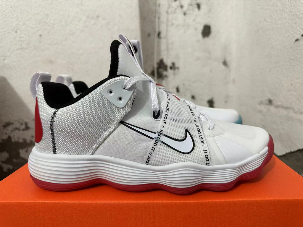 Side view of a white Nike sneaker with a black-outlined Swoosh and printed strap.