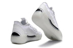 All-white Jordan Luka 39 shoes shown from the heel and outsole
