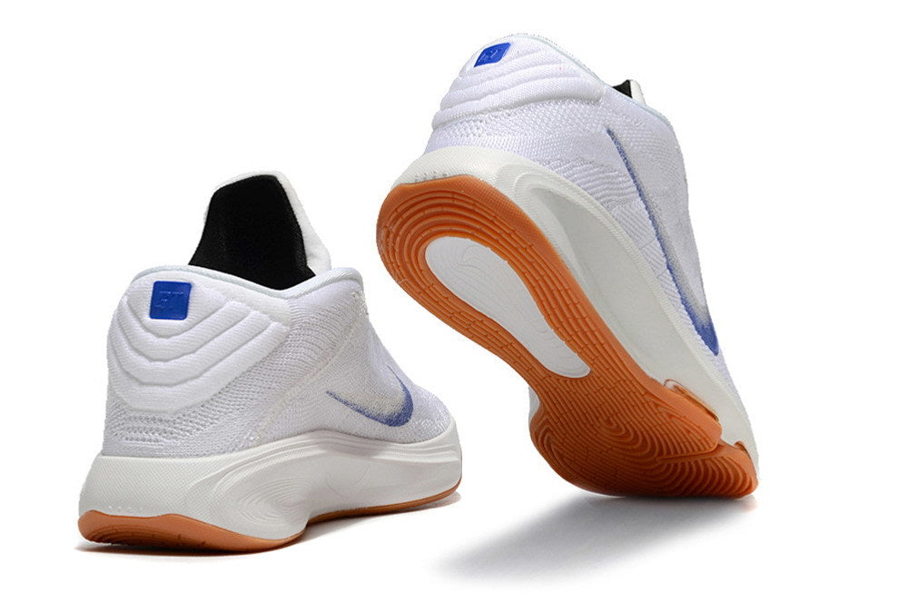 White and blue Nike GT Hustle 3 shoes shown from the heel and outsole.