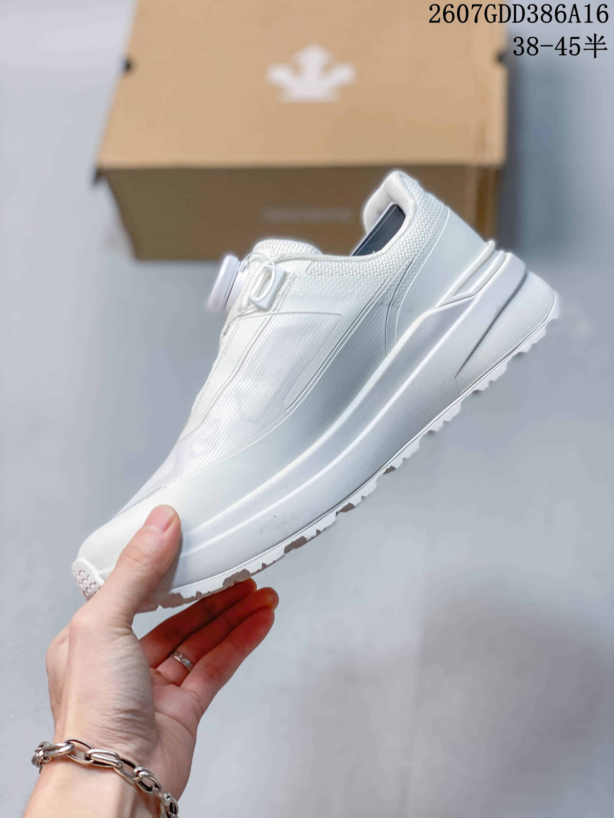 Side profile of a white low-top sneaker showing the layered upper, streamlined midsole, and textured outsole edge.