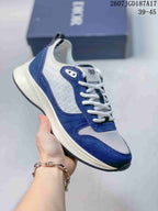 Blue and white Dior B25 Runner sneaker with white laces, mesh panels, and a light outsole.