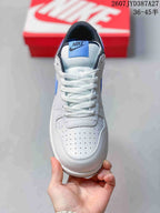 Top view showing the perforated toe panel, white laces and padded tongue.