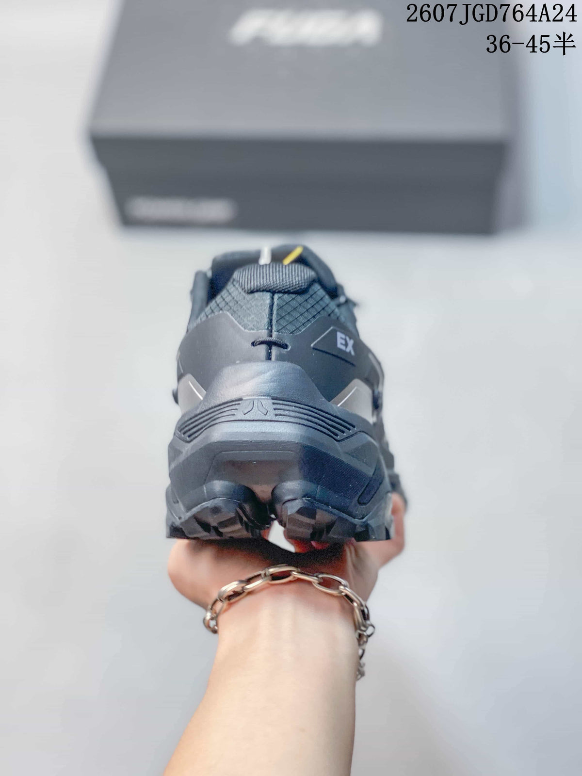 Rear view of the trail shoe showing the reinforced heel and outsole tread.