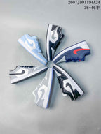 Several low-top Jordan sneakers arranged in a circular display, showing black-and-white, light blue-and-white, grey-and-white, and navy-and-red colorways.