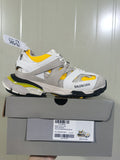 Balenciaga Track sneaker in yellow, white and grey shown on its box; the box label identifies style 542023 W1ST3 0258, color Yellow/White/Grey and size E 41.