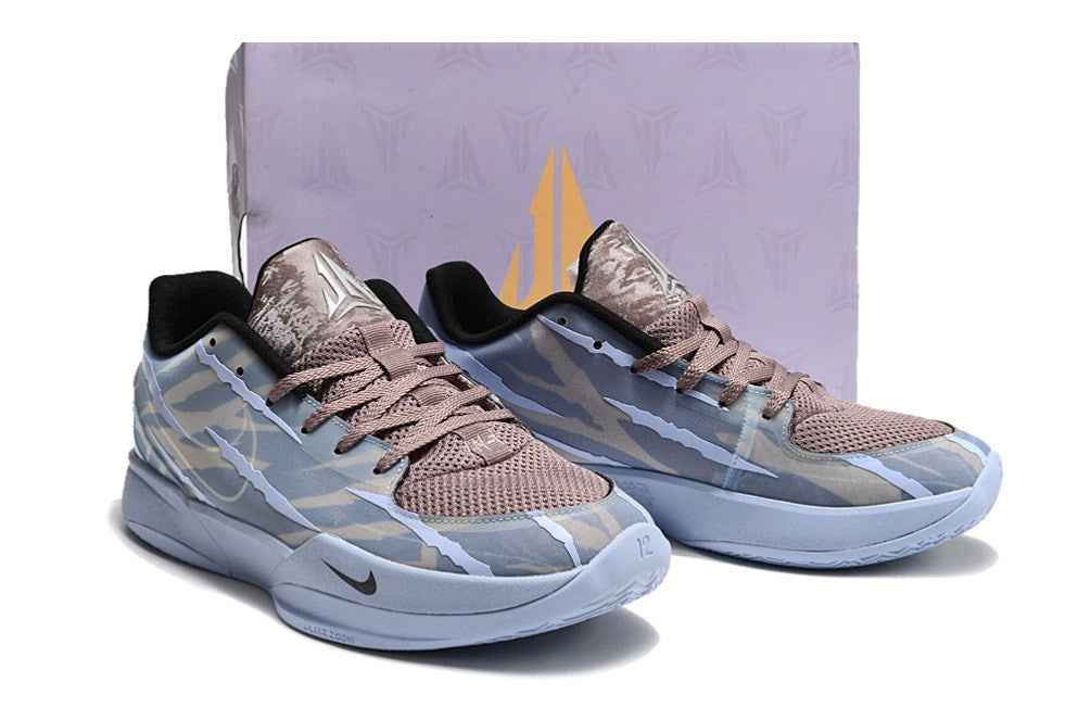 Blue-gray Ja 2 shoes pictured in front of a shoe box.