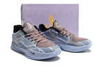 Blue-gray Ja 2 shoes pictured in front of a shoe box.