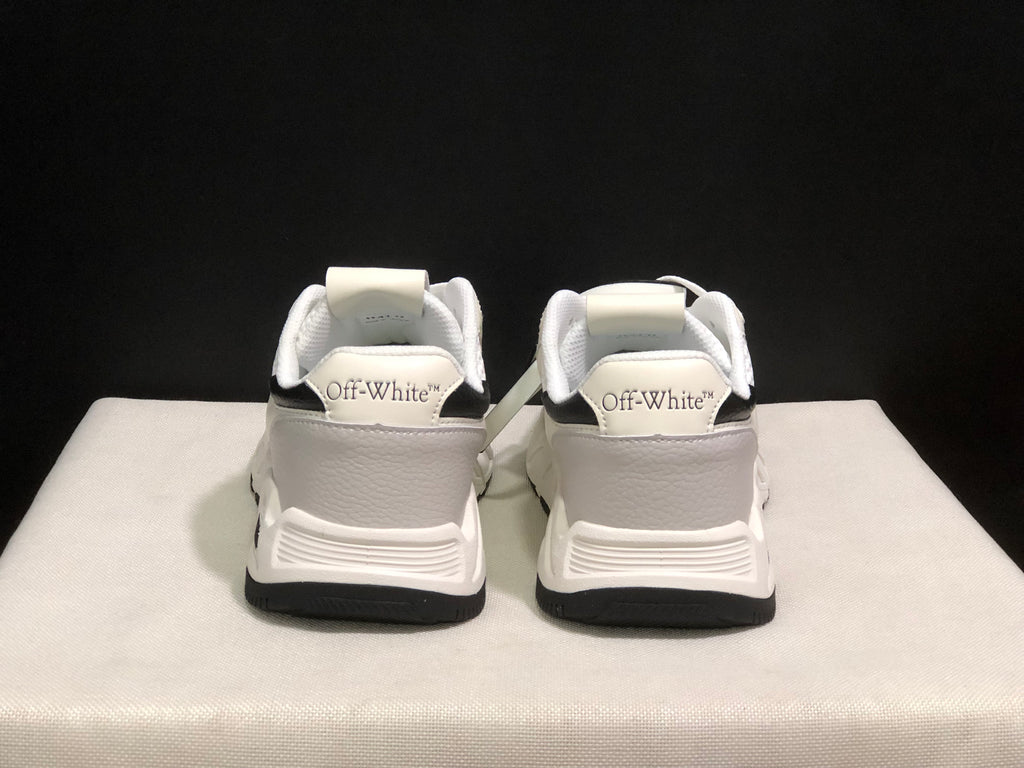 Rear view of the sneaker pair showing Off-White branding on the heel panels and black outsole edges.