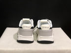 Rear view of the sneaker pair showing Off-White branding on the heel panels and black outsole edges.