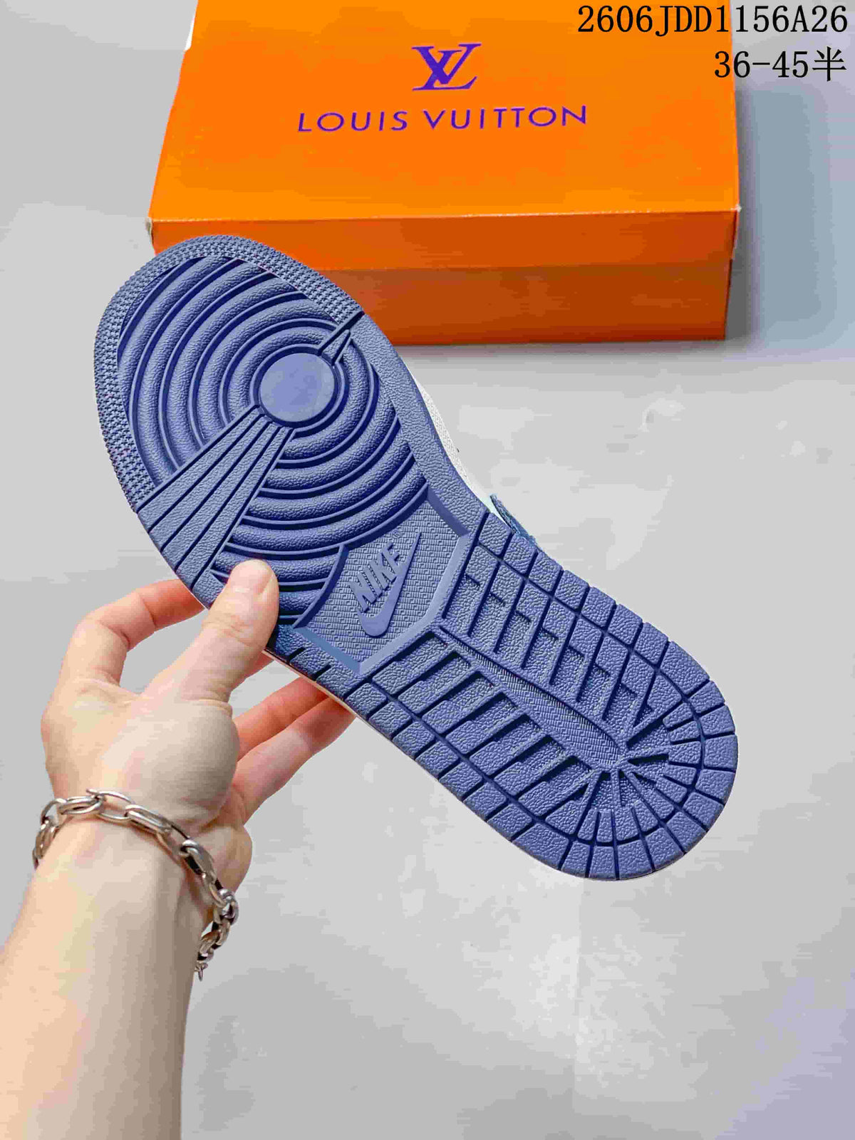 Close view of the blue rubber outsole showing concentric traction rings, radiating grooves, and a textured tread pattern.
