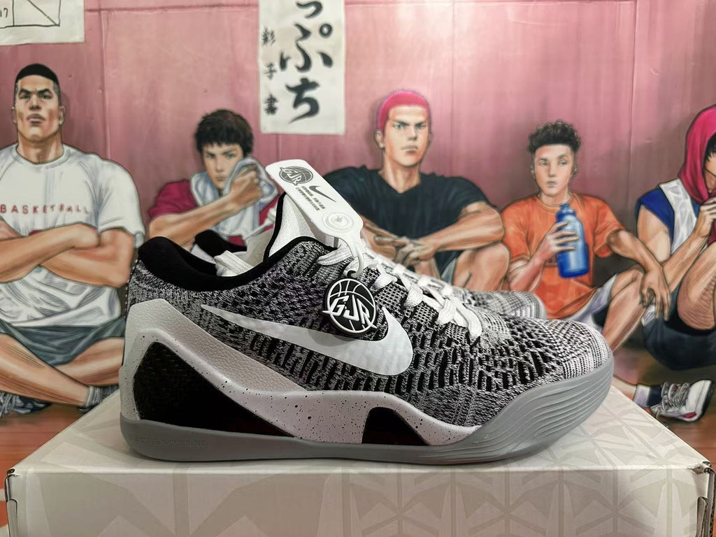 Side view of one sneaker showing the contrasting swoosh, circular side emblem, layered midsole and textured upper.