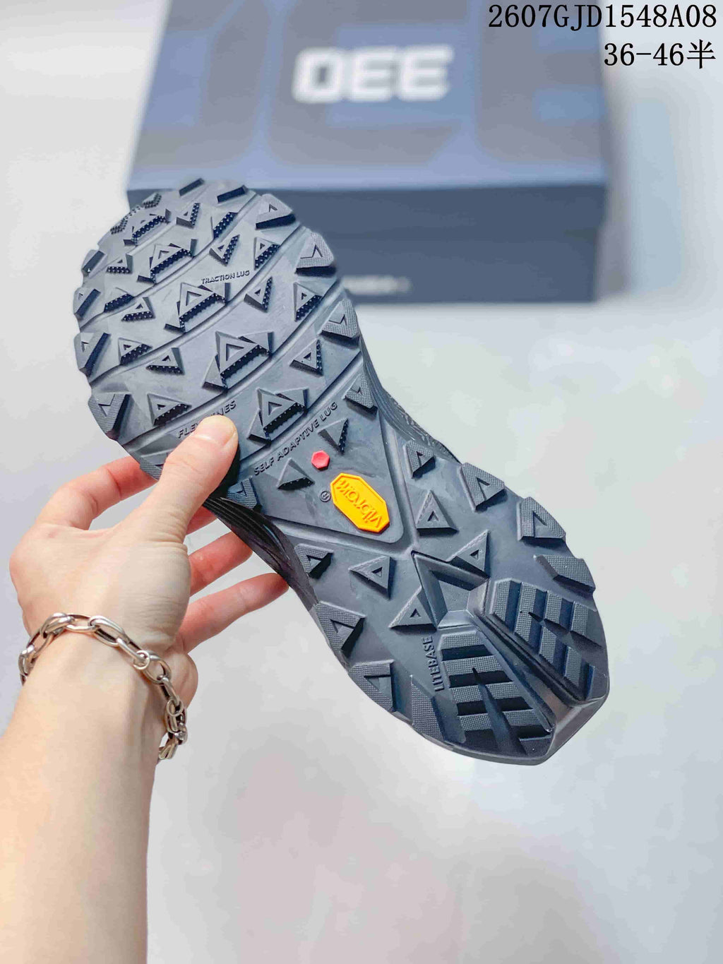 Close view of the Kailas shoe outsole showing deep triangular lugs and a Vibram marking.