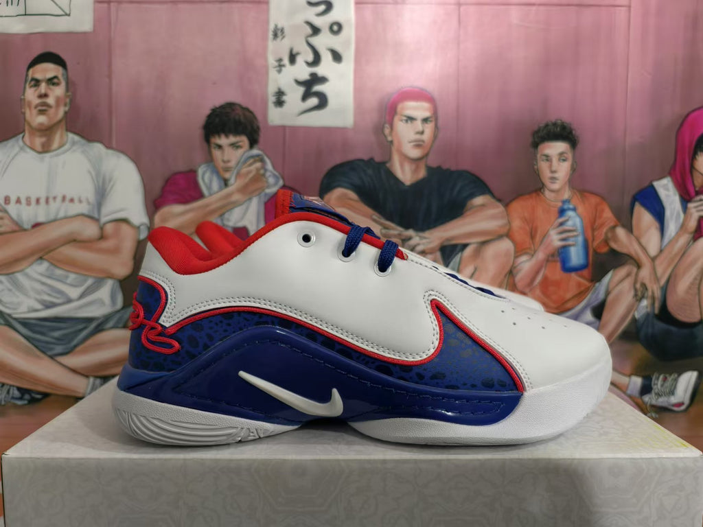 Side profile showing white and blue Nike basketball shoes with red-trimmed patterned panels.