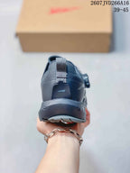 Rear view showing the padded heel collar, heel pull tab, and layered outsole construction.