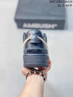 Rear view showing the black heel counter and visible Ambush branding.