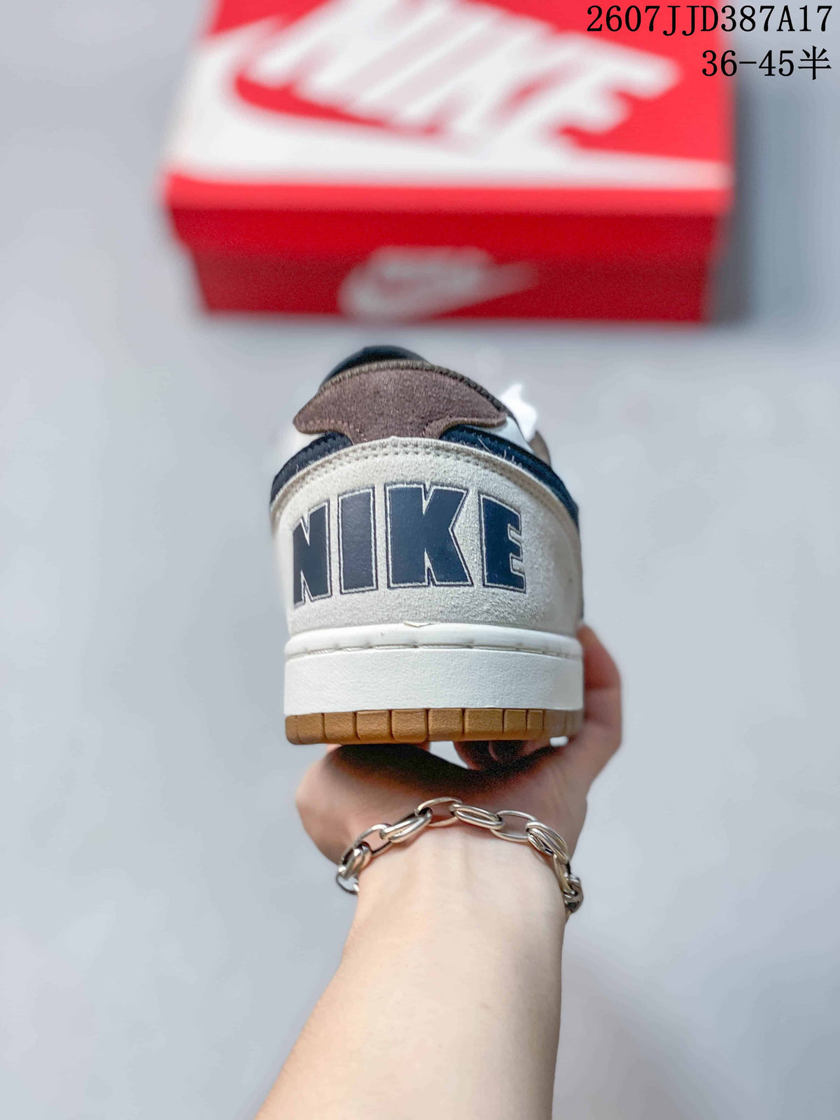 Rear view of the sneaker showing the Nike heel branding and gum outsole edge.