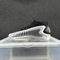 Black high-top sneaker with a sculpted silver mesh-pattern side panel.