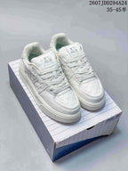 Pair of white MLB sneakers with matching laces and layered soles displayed on a shoebox; visible overlay text includes a 35–45 size range.
