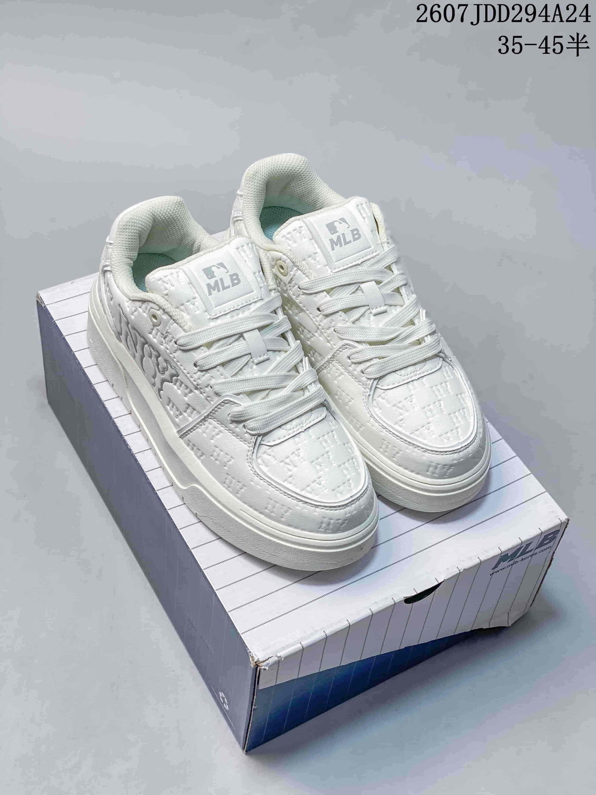 Pair of white MLB sneakers with matching laces and layered soles displayed on a shoebox; visible overlay text includes a 35–45 size range.