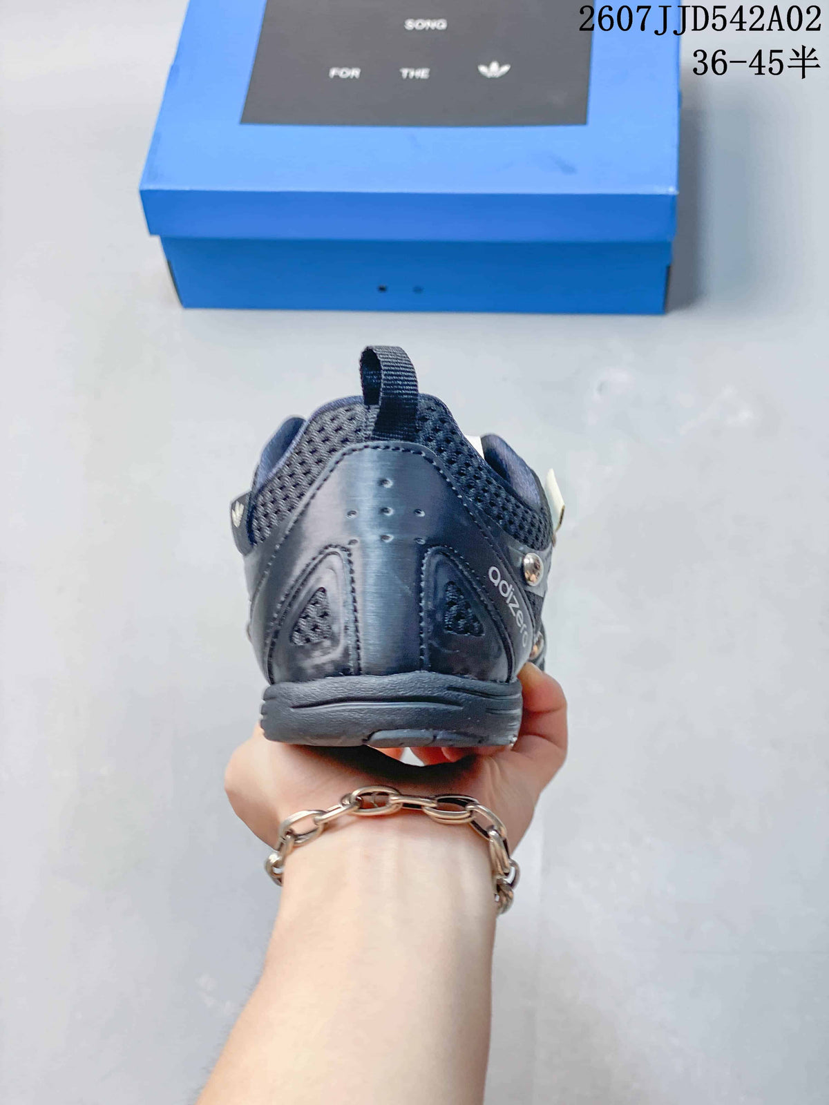Rear view of a charcoal sneaker showing the heel and collar