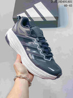 Dark gray Adidas Terrex low-top shoe with a white sole; image displays the size range 40–45.