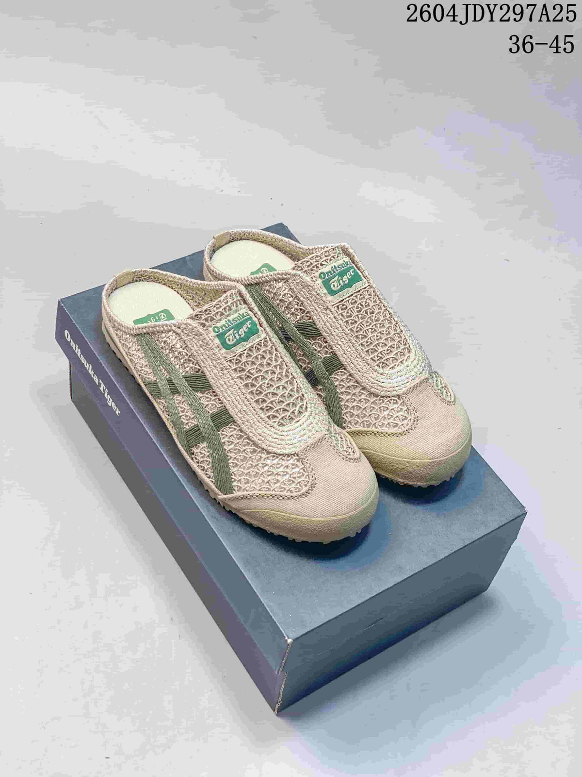 Pair of beige and green Onitsuka Tiger Mexico 66 Sabot sneakers displayed on a shoe box.