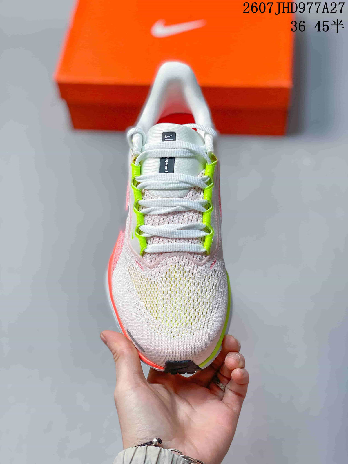 Top view showing the white laces, neon green lace accents, and light pink upper.