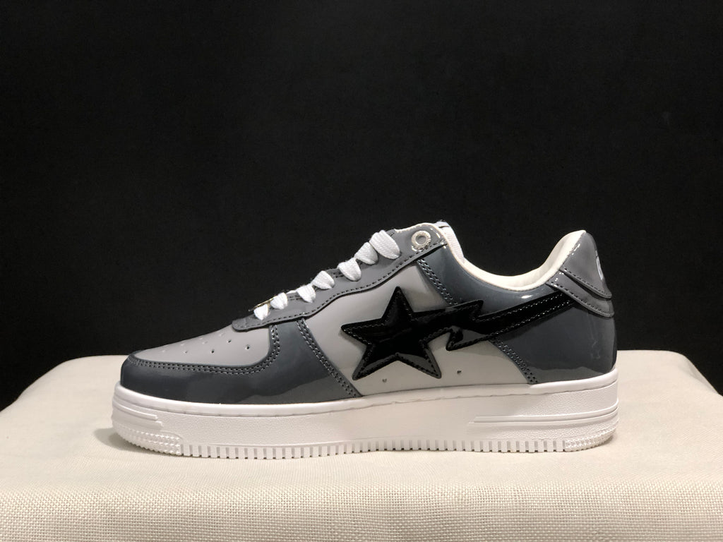 Side view highlighting the glossy black star detail and BAPE heel emblem.