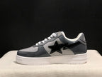 Side view highlighting the glossy black star detail and BAPE heel emblem.